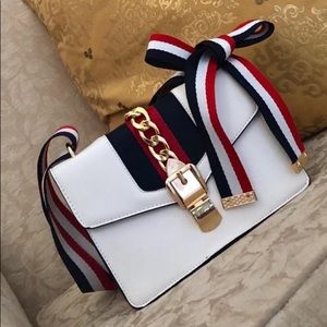 Leather cross body bag bow tie handbag